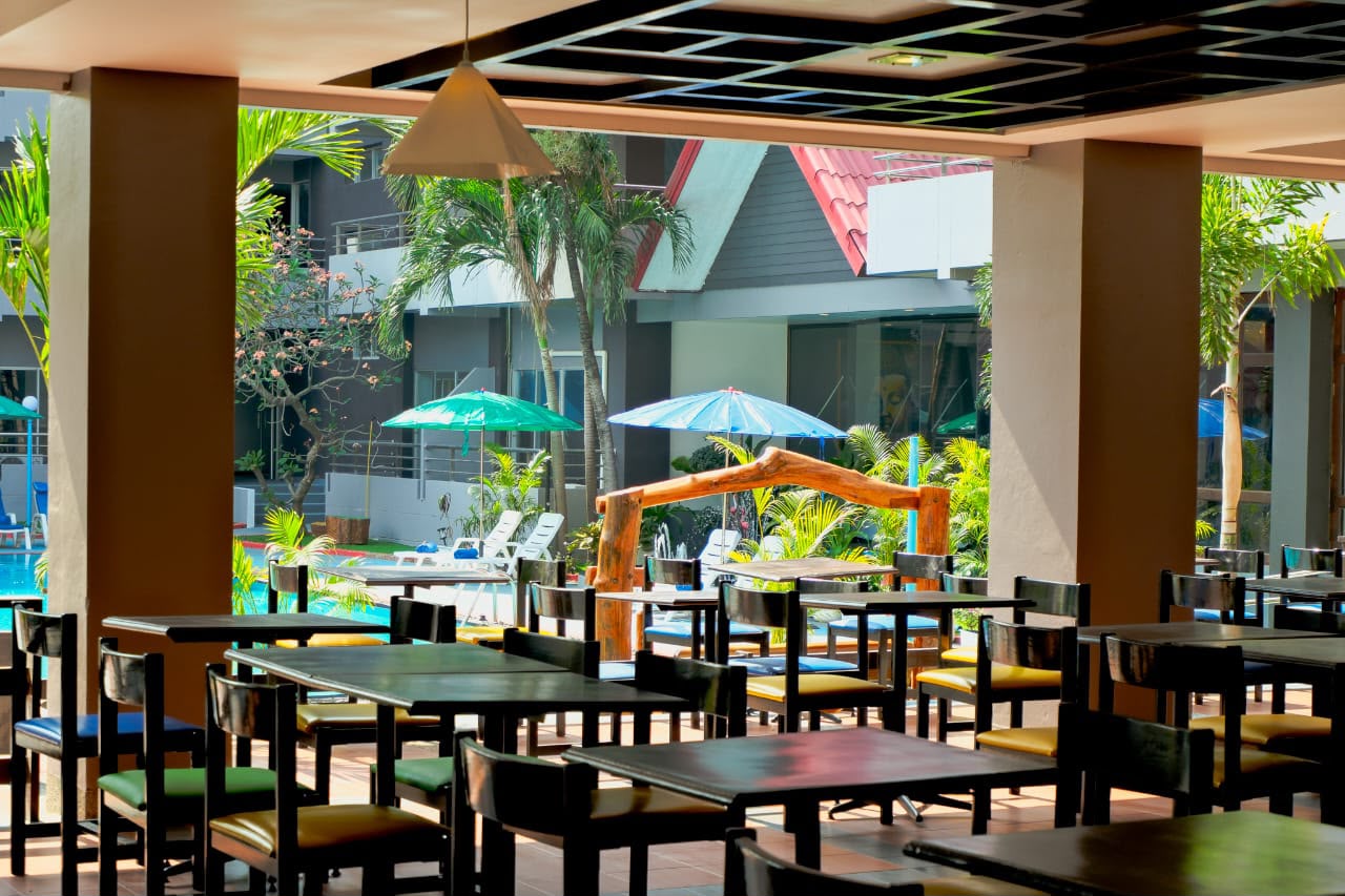 Restaurant overlooking the pool — evening ambience